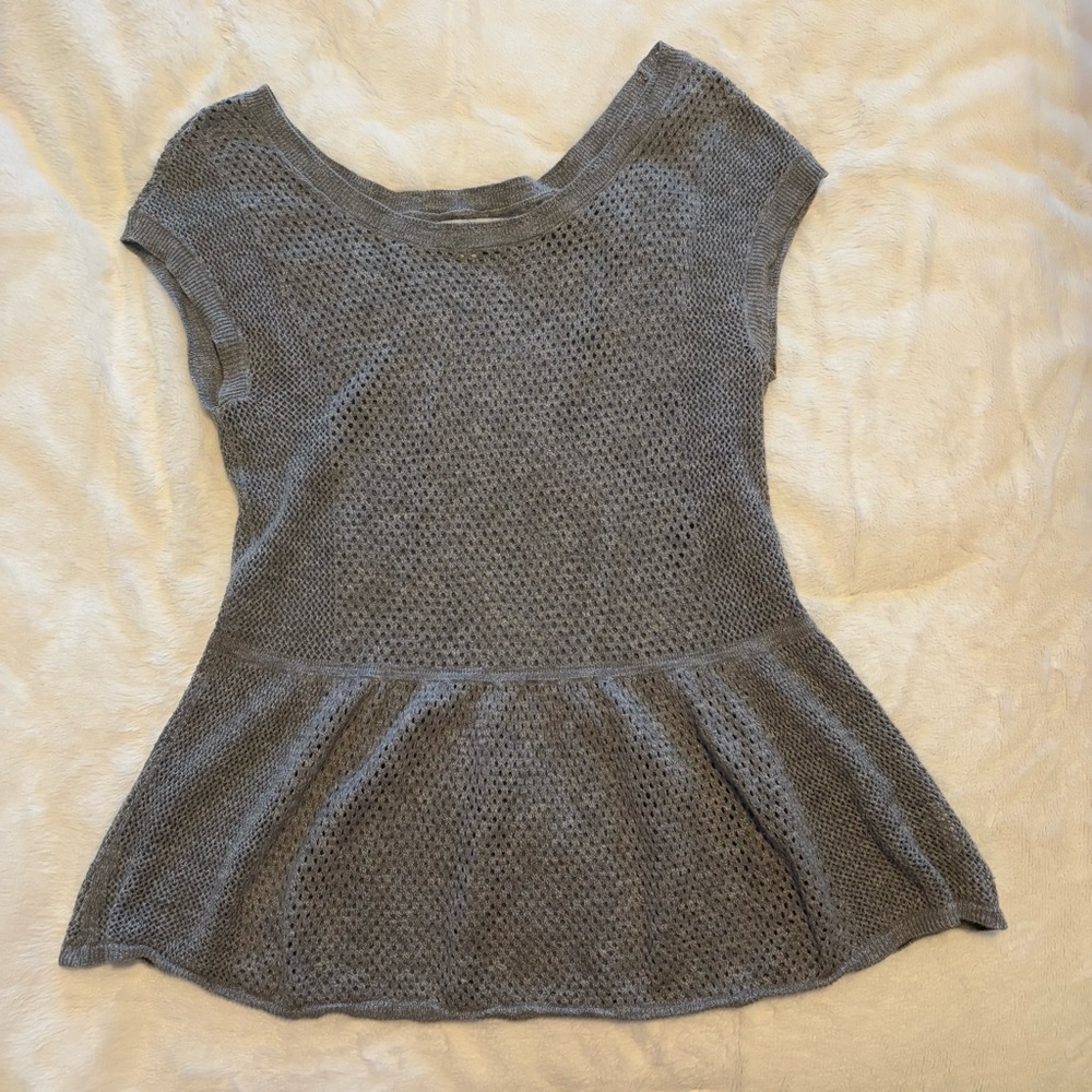Loose knit peplum top